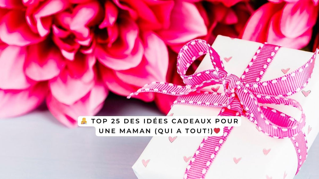 Cadeau emballé avec un ruban rose posé devant de grandes fleurs roses – idée cadeau pour une maman qui a tout.