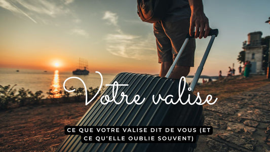 Personne tirant une valise au coucher du soleil, symbole de voyage et de liberté